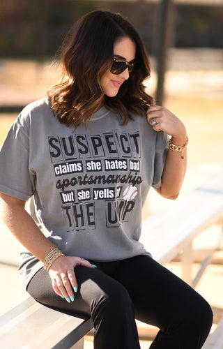 Suspect claims she hates bad sportsmanship tee