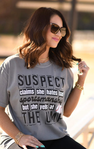 Suspect claims she hates bad sportsmanship tee