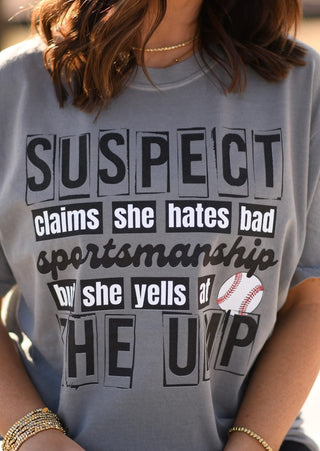 Suspect claims she hates bad sportsmanship tee